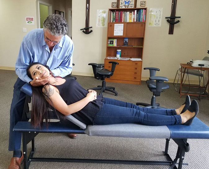 dr. gorgas performing natural chiropractic